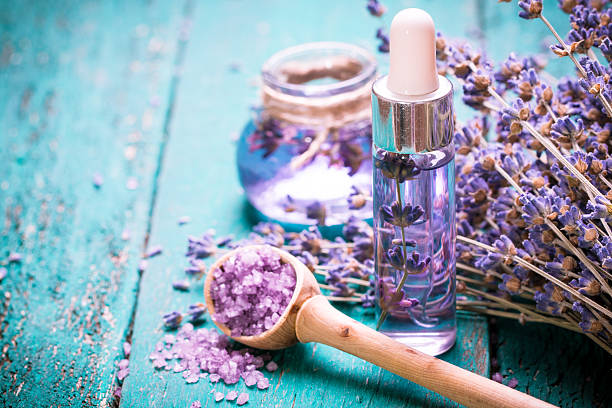 Lavender flower,oil,salt, spa beauty concept. wood old background.